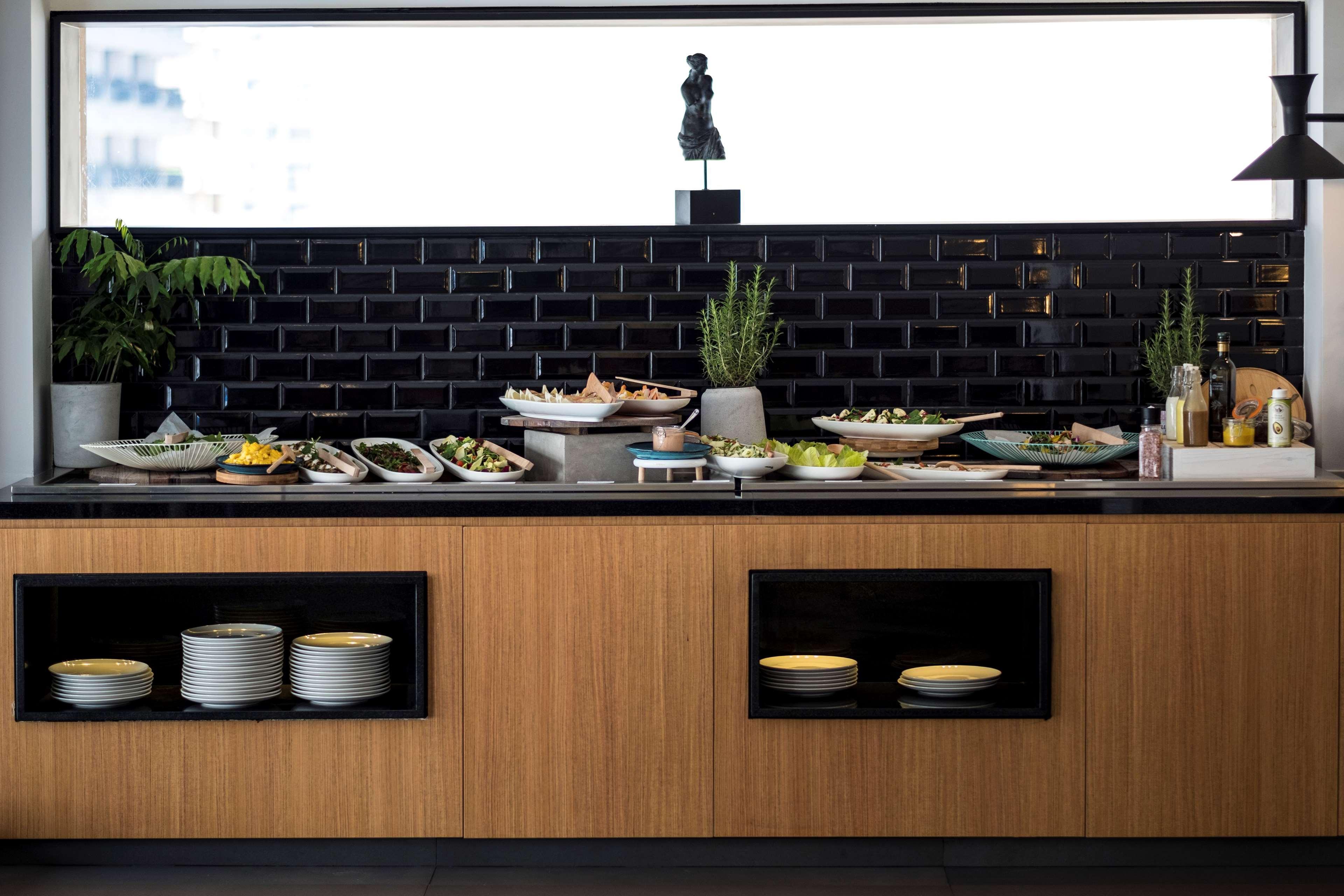 Radisson Blu Hotel, Beirut Verdun Exterior photo A typical open kitchen